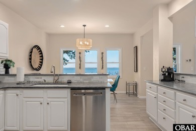 Set on the soundfront in The Currituck Club's Magnolia Bay on The Currituck Golf Club in North Carolina - for sale on GolfHomes.com, golf home, golf lot