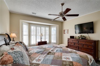 Start and end your days enjoying lagoon and wood views from your on Hidden Cypress Golf Club in South Carolina - for sale on GolfHomes.com, golf home, golf lot