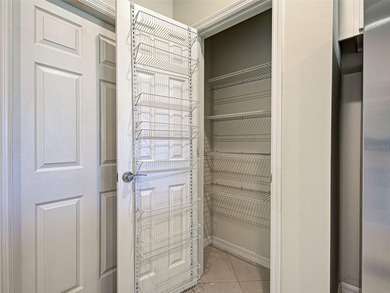 This beautifully maintained *SEAGROVE* villa is ideally located on Sarasota National Golf Club in Florida - for sale on GolfHomes.com, golf home, golf lot