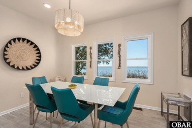 Set on the soundfront in The Currituck Club's Magnolia Bay on The Currituck Golf Club in North Carolina - for sale on GolfHomes.com, golf home, golf lot