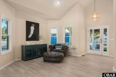 Set on the soundfront in The Currituck Club's Magnolia Bay on The Currituck Golf Club in North Carolina - for sale on GolfHomes.com, golf home, golf lot