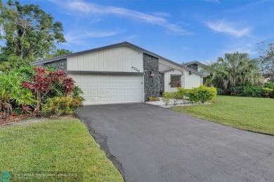 Welcome To This Stunning 3 Bedrooms 2.5 Bath Home With No HOA In on Woodmont Country Club in Florida - for sale on GolfHomes.com, golf home, golf lot