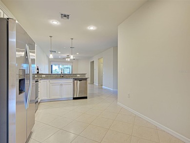 This beautifully maintained *SEAGROVE* villa is ideally located on Sarasota National Golf Club in Florida - for sale on GolfHomes.com, golf home, golf lot