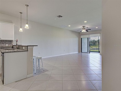 This beautifully maintained *SEAGROVE* villa is ideally located on Sarasota National Golf Club in Florida - for sale on GolfHomes.com, golf home, golf lot
