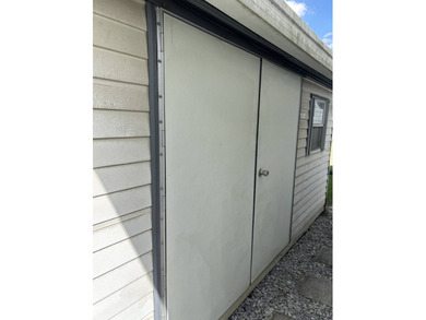 Custom designed with RV hookups 34X28 upstairs for 2 bedrooms on Deer Creek RV Golf Resort in Florida - for sale on GolfHomes.com, golf home, golf lot