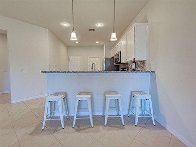 This beautifully maintained *SEAGROVE* villa is ideally located on Sarasota National Golf Club in Florida - for sale on GolfHomes.com, golf home, golf lot