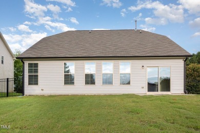 This charming 3-bedroom, 2-bathroom home combines comfort and on Olde Liberty Golf and Country Club in North Carolina - for sale on GolfHomes.com, golf home, golf lot