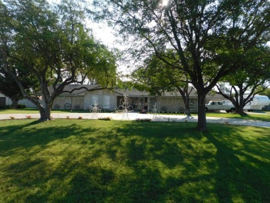 This beautifully maintained 5-bed, 4-bath ranch-style home on Pampa Country Club in Texas - for sale on GolfHomes.com, golf home, golf lot