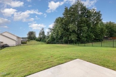 This charming 3-bedroom, 2-bathroom home combines comfort and on Olde Liberty Golf and Country Club in North Carolina - for sale on GolfHomes.com, golf home, golf lot