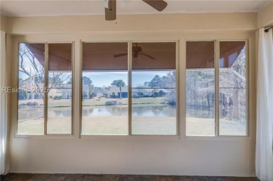 Start and end your days enjoying lagoon and wood views from your on Hidden Cypress Golf Club in South Carolina - for sale on GolfHomes.com, golf home, golf lot
