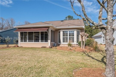 Start and end your days enjoying lagoon and wood views from your on Hidden Cypress Golf Club in South Carolina - for sale on GolfHomes.com, golf home, golf lot