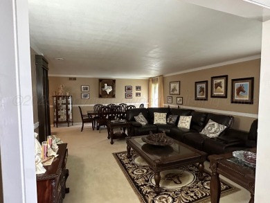 This beautifully maintained 5-bed, 4-bath ranch-style home on Pampa Country Club in Texas - for sale on GolfHomes.com, golf home, golf lot