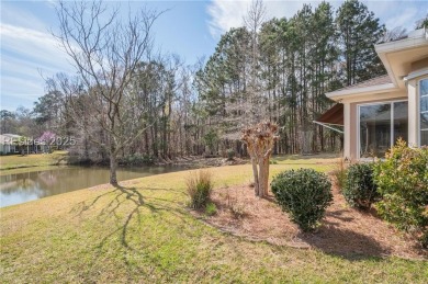 Start and end your days enjoying lagoon and wood views from your on Hidden Cypress Golf Club in South Carolina - for sale on GolfHomes.com, golf home, golf lot