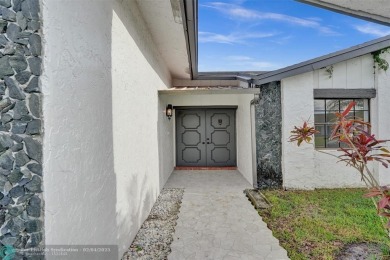 Welcome To This Stunning 3 Bedrooms 2.5 Bath Home With No HOA In on Woodmont Country Club in Florida - for sale on GolfHomes.com, golf home, golf lot