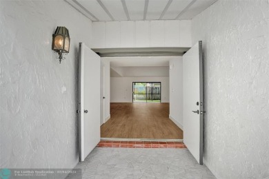 Welcome To This Stunning 3 Bedrooms 2.5 Bath Home With No HOA In on Woodmont Country Club in Florida - for sale on GolfHomes.com, golf home, golf lot