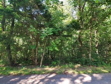 Nestled in a peaceful corner of Bella Vista, this .33acre lot is on Bella Vista - Metfield Golf Complex and Country Club in Arkansas - for sale on GolfHomes.com, golf home, golf lot