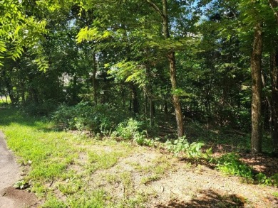 Nestled in a peaceful corner of Bella Vista, this .33acre lot is on Bella Vista - Metfield Golf Complex and Country Club in Arkansas - for sale on GolfHomes.com, golf home, golf lot
