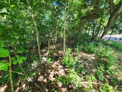 Nestled in a peaceful corner of Bella Vista, this .33acre lot is on Bella Vista - Metfield Golf Complex and Country Club in Arkansas - for sale on GolfHomes.com, golf home, golf lot