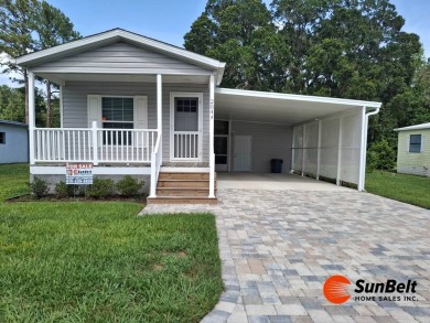 Beautiful 2023 Fleetwood Home in Rolling Greens Village - on Rolling Greens Executive Golf Community in Florida - for sale on GolfHomes.com, golf home, golf lot
