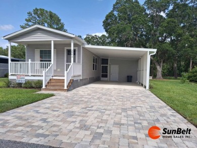 Beautiful 2023 Fleetwood Home in Rolling Greens Village - on Rolling Greens Executive Golf Community in Florida - for sale on GolfHomes.com, golf home, golf lot