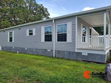 Beautiful 2023 Fleetwood Home in Rolling Greens Village - on Rolling Greens Executive Golf Community in Florida - for sale on GolfHomes.com, golf home, golf lot