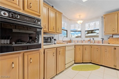 Welcome Home to Tamiami Village 55+! This well-maintained on Six Lakes Country Club in Florida - for sale on GolfHomes.com, golf home, golf lot