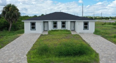 Brand New DUPLEX in Port Charlotte - Never lived in!  Each on Duffys Golf Center in Florida - for sale on GolfHomes.com, golf home, golf lot