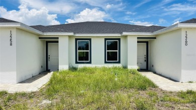 Brand New DUPLEX in Port Charlotte - Never lived in!  Each on Duffys Golf Center in Florida - for sale on GolfHomes.com, golf home, golf lot