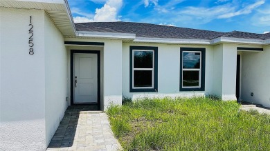 Brand New DUPLEX in Port Charlotte - Never lived in!  Each on Duffys Golf Center in Florida - for sale on GolfHomes.com, golf home, golf lot