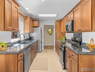 Experience elevated mountain living in this fully remodeled on Lake Estes Golf Course in Colorado - for sale on GolfHomes.com, golf home, golf lot