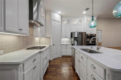 The perfect Las Colinas lock-and-leave lifestyle--no compromise on TPC Four Seasons - Las Colinas Resort in Texas - for sale on GolfHomes.com, golf home, golf lot