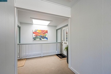 Perched atop Golden Rain Road, this beautifully light filled & on Rossmoor Golf Course in California - for sale on GolfHomes.com, golf home, golf lot