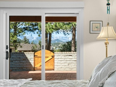 Experience elevated mountain living in this fully remodeled on Lake Estes Golf Course in Colorado - for sale on GolfHomes.com, golf home, golf lot