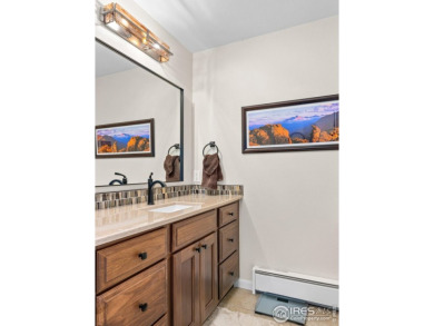 Experience elevated mountain living in this fully remodeled on Lake Estes Golf Course in Colorado - for sale on GolfHomes.com, golf home, golf lot
