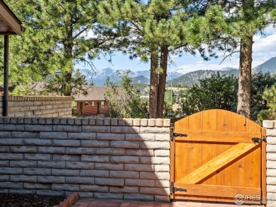 Experience elevated mountain living in this fully remodeled on Lake Estes Golf Course in Colorado - for sale on GolfHomes.com, golf home, golf lot