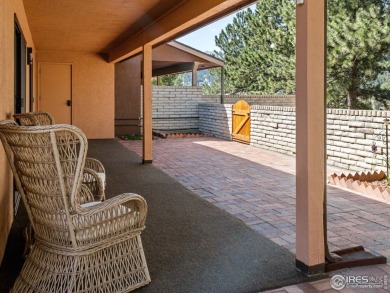 Experience elevated mountain living in this fully remodeled on Lake Estes Golf Course in Colorado - for sale on GolfHomes.com, golf home, golf lot
