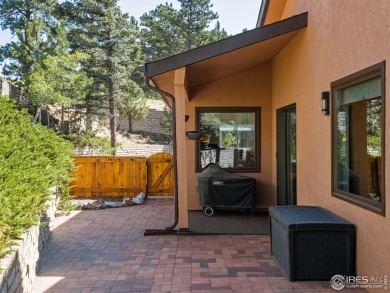 Experience elevated mountain living in this fully remodeled on Lake Estes Golf Course in Colorado - for sale on GolfHomes.com, golf home, golf lot