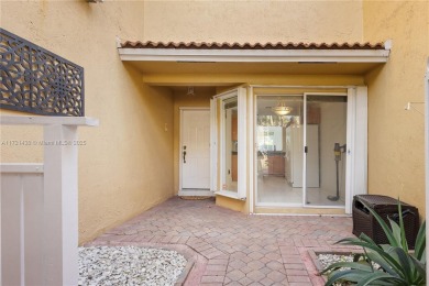 Welcome to this inviting 3-bedroom, 2.5-bathroom townhouse in on Jim McLean Signature Course in Florida - for sale on GolfHomes.com, golf home, golf lot