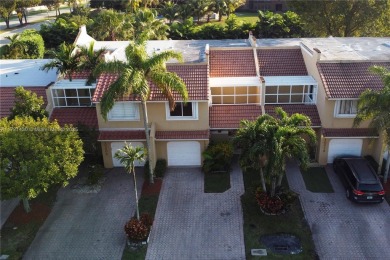 Welcome to this inviting 3-bedroom, 2.5-bathroom townhouse in on Jim McLean Signature Course in Florida - for sale on GolfHomes.com, golf home, golf lot