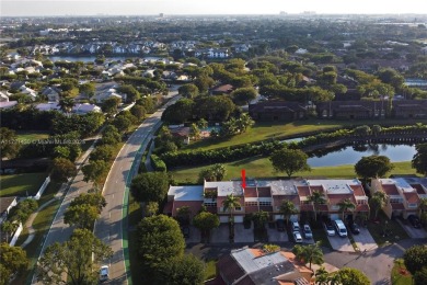 Welcome to this inviting 3-bedroom, 2.5-bathroom townhouse in on Jim McLean Signature Course in Florida - for sale on GolfHomes.com, golf home, golf lot