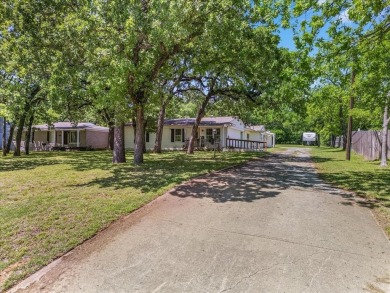 Discover this beautifully updated 4-bedroom, 2-bathroom home on Meadowbrook Golf Course in Texas - for sale on GolfHomes.com, golf home, golf lot