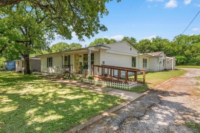 Discover this beautifully updated 4-bedroom, 2-bathroom home on Meadowbrook Golf Course in Texas - for sale on GolfHomes.com, golf home, golf lot