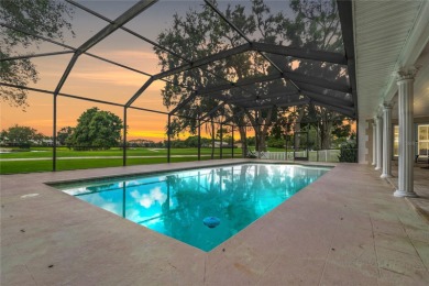 Step into timeless elegance in this stunning Colonial-style on Feather Sound Country Club in Florida - for sale on GolfHomes.com, golf home, golf lot