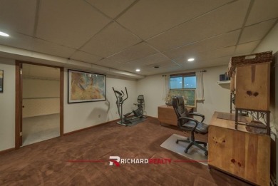 Situated on the ninth hole of the Olive Glenn Golf Course, 10 on Olive Glenn Golf and Country Club in Wyoming - for sale on GolfHomes.com, golf home, golf lot