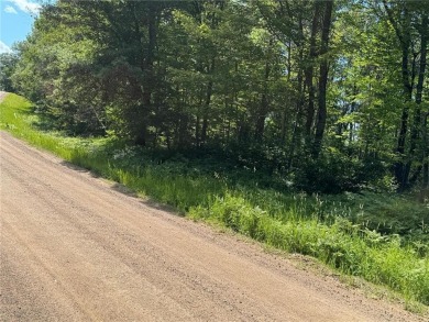 This level wooded lot is a great option for buyers looking to on Deacons Lodge Golf Course in Minnesota - for sale on GolfHomes.com, golf home, golf lot