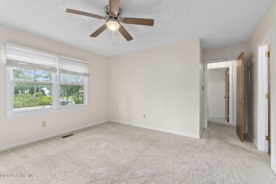 This 2-bedroom, 3-bath home, second row from the sound, offers a on The Country Club of the Crystal Coast in North Carolina - for sale on GolfHomes.com, golf home, golf lot