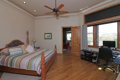 Wonderful ranch style home situated overlooking the 9th green in on The Golf Club At Redlands Mesa in Colorado - for sale on GolfHomes.com, golf home, golf lot