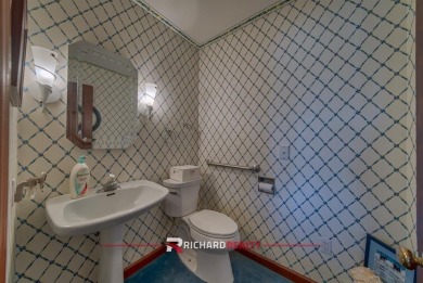 Situated on the ninth hole of the Olive Glenn Golf Course, 10 on Olive Glenn Golf and Country Club in Wyoming - for sale on GolfHomes.com, golf home, golf lot