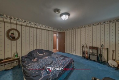 Situated on the ninth hole of the Olive Glenn Golf Course, 10 on Olive Glenn Golf and Country Club in Wyoming - for sale on GolfHomes.com, golf home, golf lot