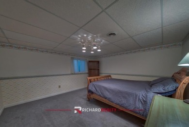 Situated on the ninth hole of the Olive Glenn Golf Course, 10 on Olive Glenn Golf and Country Club in Wyoming - for sale on GolfHomes.com, golf home, golf lot